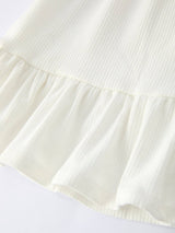 White Top And Daisy Flared Pants Outfit