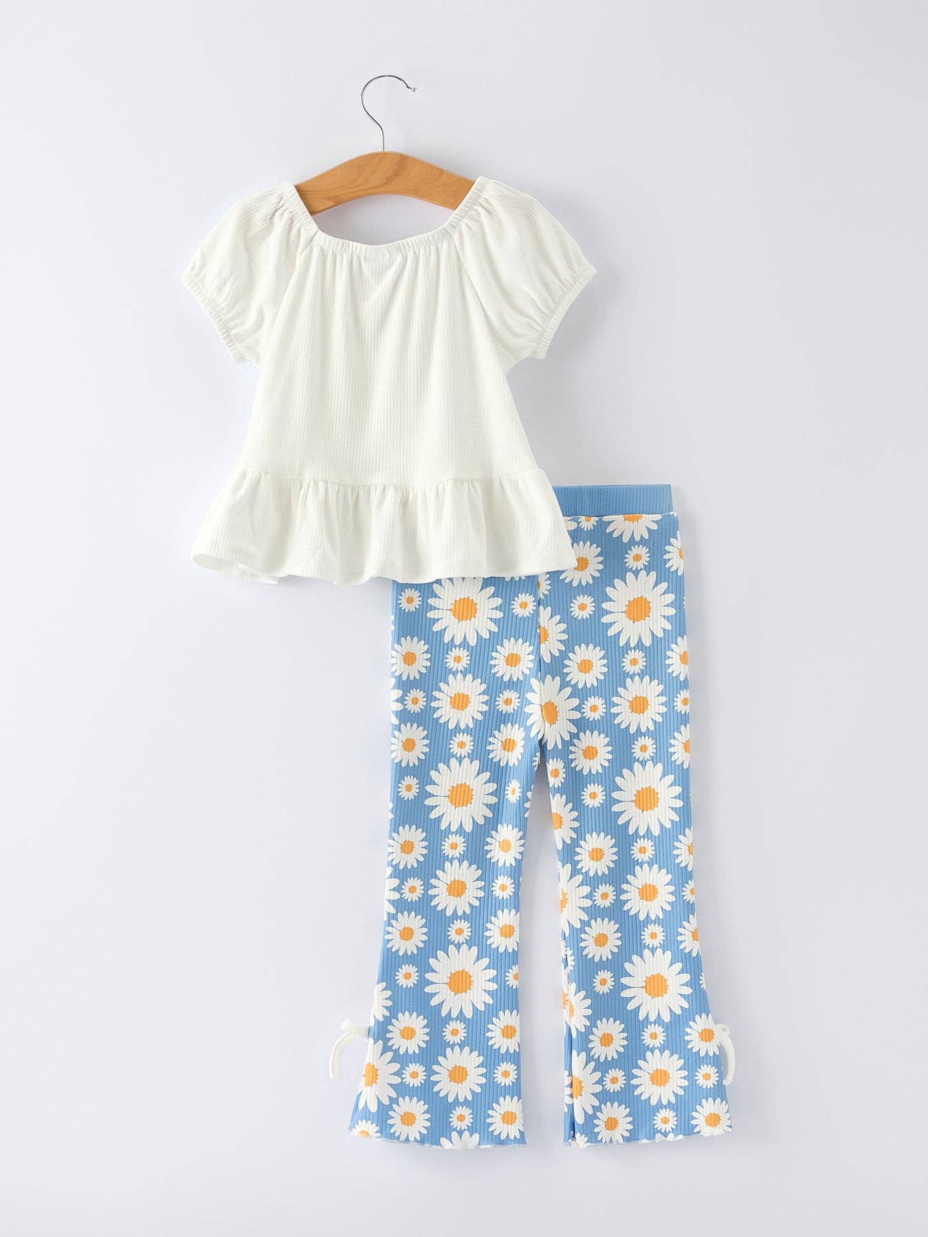 White Top And Daisy Flared Pants Outfit